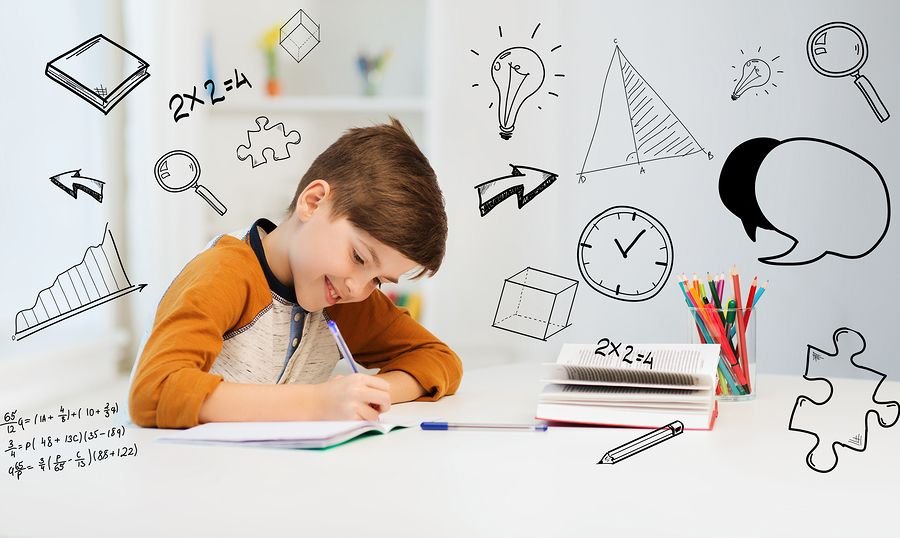 LKG students practicing writing